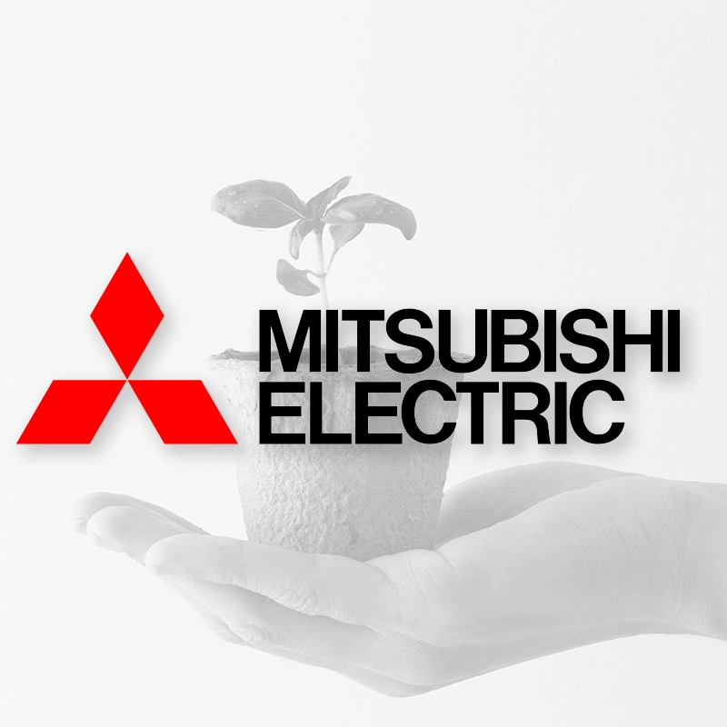 Logo Mitsubishi Electric par dessus un fond avec une main tenant une bouture de plante